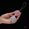 Holding LELO Ben Wa and Kegel Luna Pleasure Beads