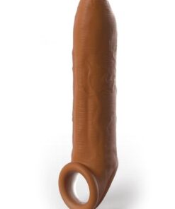 Instantly transform your penis into a pleasure machine with Fantasy X-tensions Elite! Made from ultra-hygienic Elite Silicone™, this performance-enhancement sleeve fits like a glove and feels like a second skin, giving wearers extra length, increased girth, and maximum confidence. Satisfy your partner and avoid embarrassing midway letdowns with your new secret weapon! Perfect for people with ED and performance anxiety, Fantasy X-tensions Elite enhancers will deliver results both partners will appreciate. Your Fantasy X-tension Elite is super-stretchy to accommodate most sizes and snug enough to help you last longer. Your partner will enjoy deeper penetration with the removable extender at the tip, while the ultra-realistic sleeve makes you 66% thicker all around. The flexible ball strap wraps tightly around your sack for a comfortable, secure fit that leads to a longer, more satisfying finish. This could be you! KEY PRODUCT FEATURES • 3" (7.6 cm) removable extender • Adds up to 66% girth • Flexible ball strap • High quality Elite Silicone™ • Lifelike textures & details • Stretches to fit most sizes • Perfect for people with ED