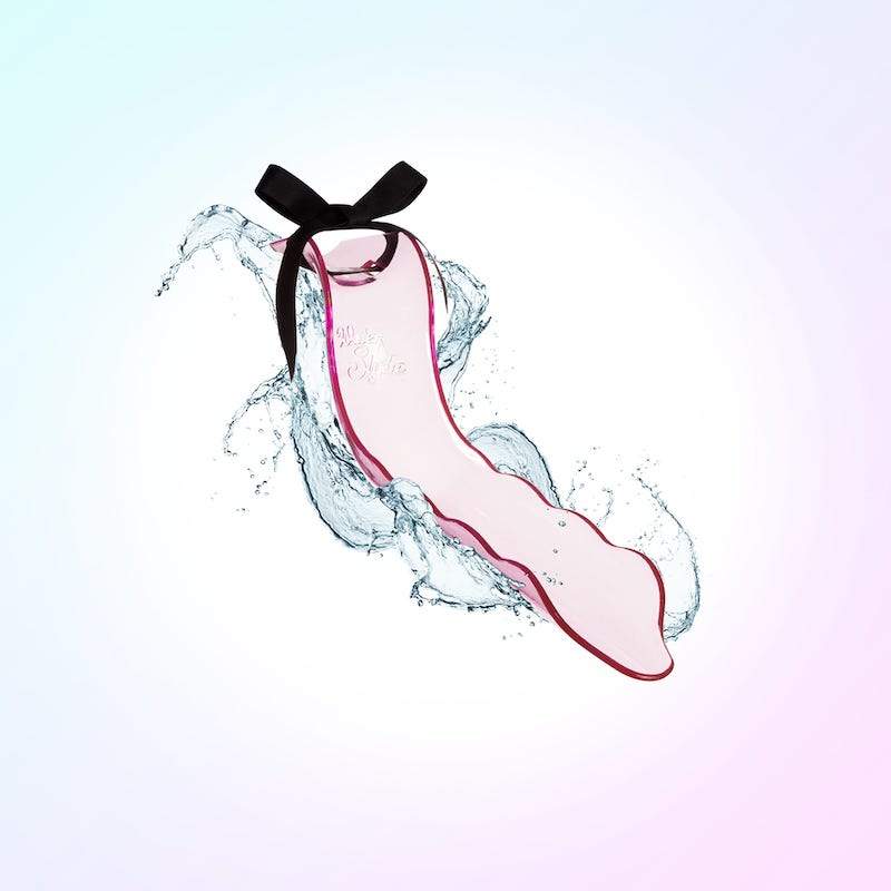 Transform your bath into a sanctuary of pleasure with the Waterslyde Pink Aquatic Stimulator by Lovability. This patented, sleek plastic water diverter effortlessly attaches to most forward-facing bathtub spouts, directing a gentle flow of water to your body's most sensitive areas. Designed for external use, it allows for a comfortable, hands-free experience, eliminating the need for awkward positioning. Crafted from body-safe materials, the Waterslyde is both recyclable and disability-friendly, ensuring inclusivity and sustainability. Its easy-to-use design requires no batteries or complicated setup—simply tie it to your faucet using the included suede-like ribbon, adjust the water temperature, and let the soothing stream provide natural stimulation. Whether you're seeking relaxation or exploring new dimensions of pleasure, the Waterslyde offers a unique, water-powered experience that many users find both satisfying and rejuvenating.