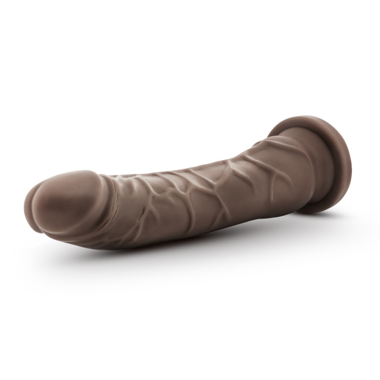 Dr. Skin Basic 8.5 Chocolate Brown Dildo is ready for you. This hard cock wants to fill you up and make you scream! The Slim 8.5 has 8 inches in length and 1.5 inches of girth for you to master. He may be slim, but he's long and strong! Slim 8 looks and feels so real: his firmness and bulging veins show that he can not wait for you. The slightly curved shaft is perfect for G-Spot or P-Spot stimulation. The suction cup base is perfect for solo use and it is harness compatible for pegging and other couples play! Phthalate free PVC, both body safe and easy to clean! Just wash with warm soap and water or your favorite toy cleaner before and after each use. Pat dry with soft towel before storing. Features: G-Spot or P-Spot shaped for stimulation with realistic look and feel. Feel. Soft realistic feel with just the right amount of firmness for a better than real experience. Versatile.Strong suction cup base will stick to all smooth flat surfaces! The base also makes this harness compatible. Peace of mind. Made of body safe non-porous PVC. Contains no synthetic fragrance or latex. It meets or exceeds international Safety Standards as set forth By CE And RoHS Directives. It is your body be mindful of what you put in it. Size 9 inches length, 8 inches insertable by 1.5 inches width. Categories: Dildos, Dongs, Realistic Small, Medium, Dildos and Dongs Realistic. Blush Novelties - Dr. Skin. Restricted, Amazon Restricted. 2024.